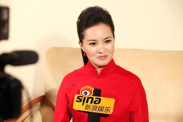 她是第一位博士级歌唱家，12次荣登春晚，丈夫身价不菲也是博士_1-第10张图片-九妖电影
